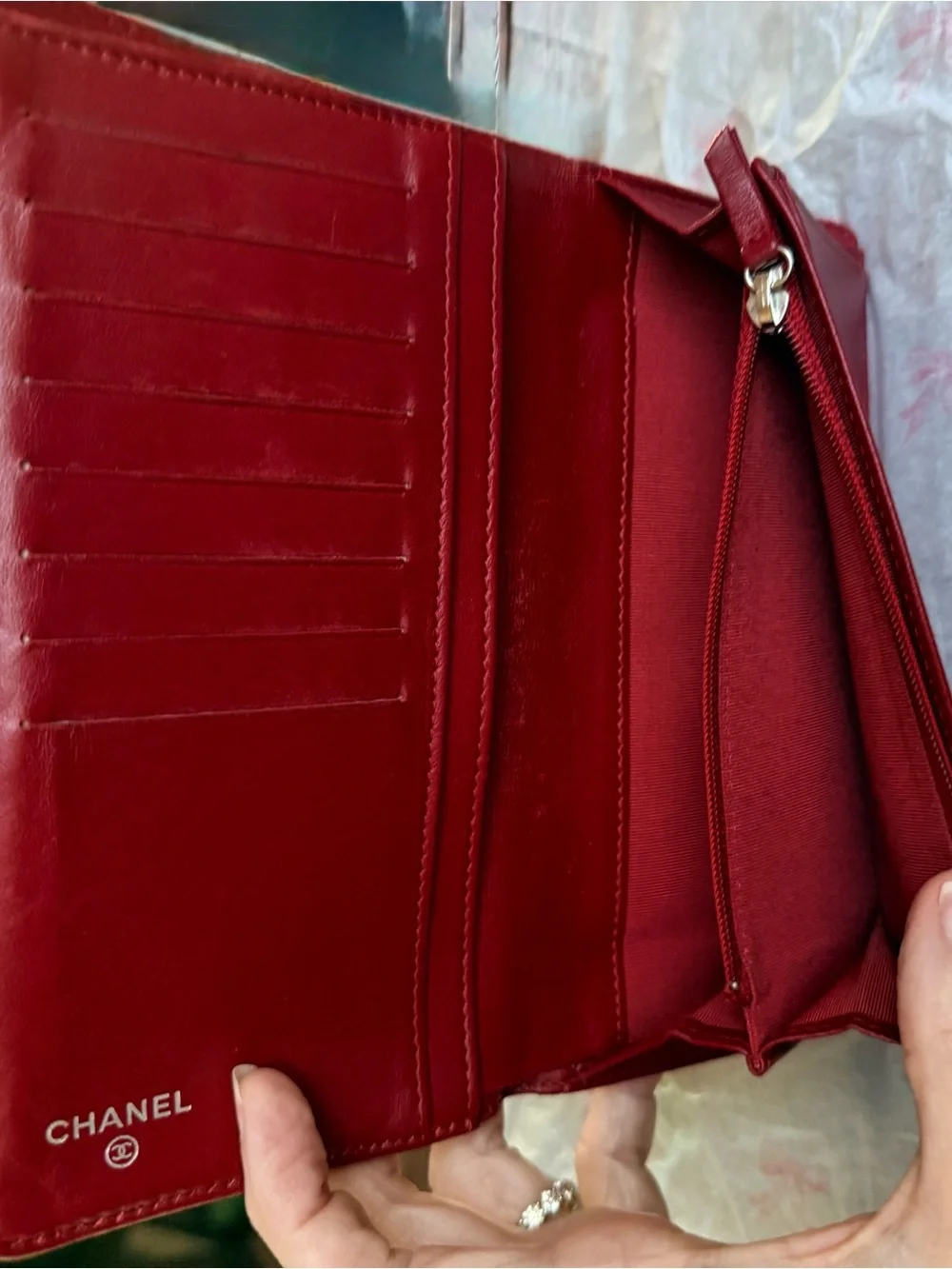 Authentic CHANEL Quilted Red Lambskin Leather Long Wallet with Silver CC Emblem.